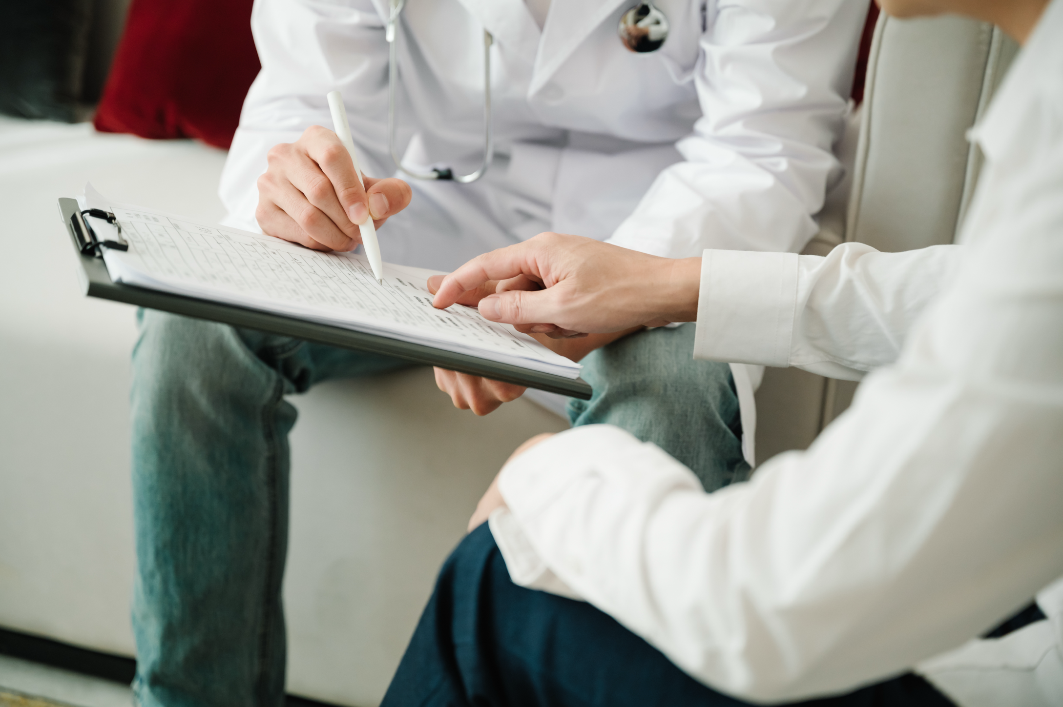 Clinical compliance team reviewing documentation